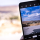 A photo of the OnePlus 10T taking a photo outside of a window